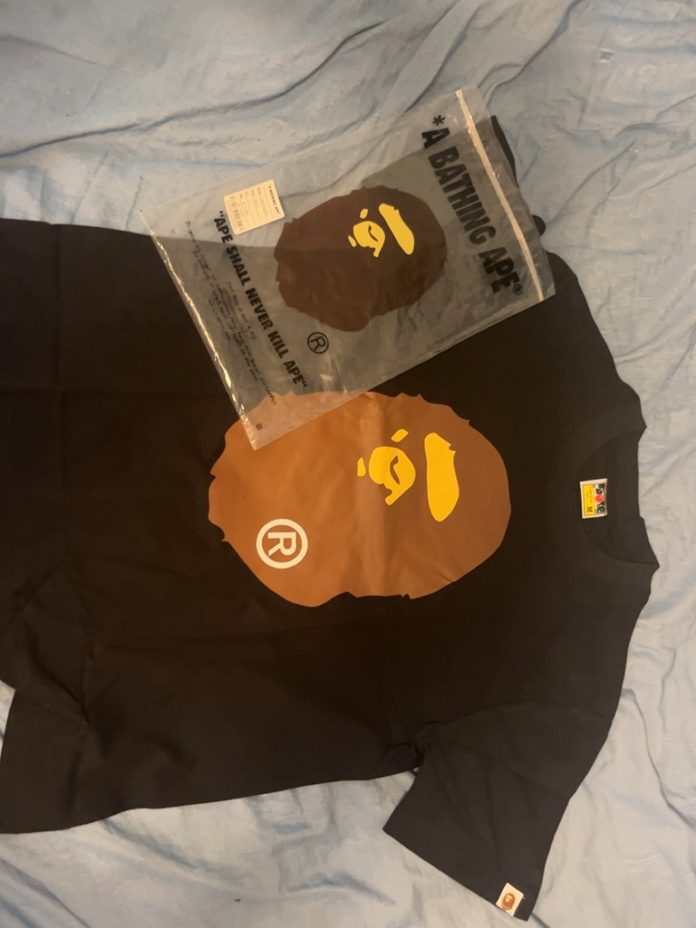 A Bathing Ape Black Graphic Tee with Brown Ape Logo